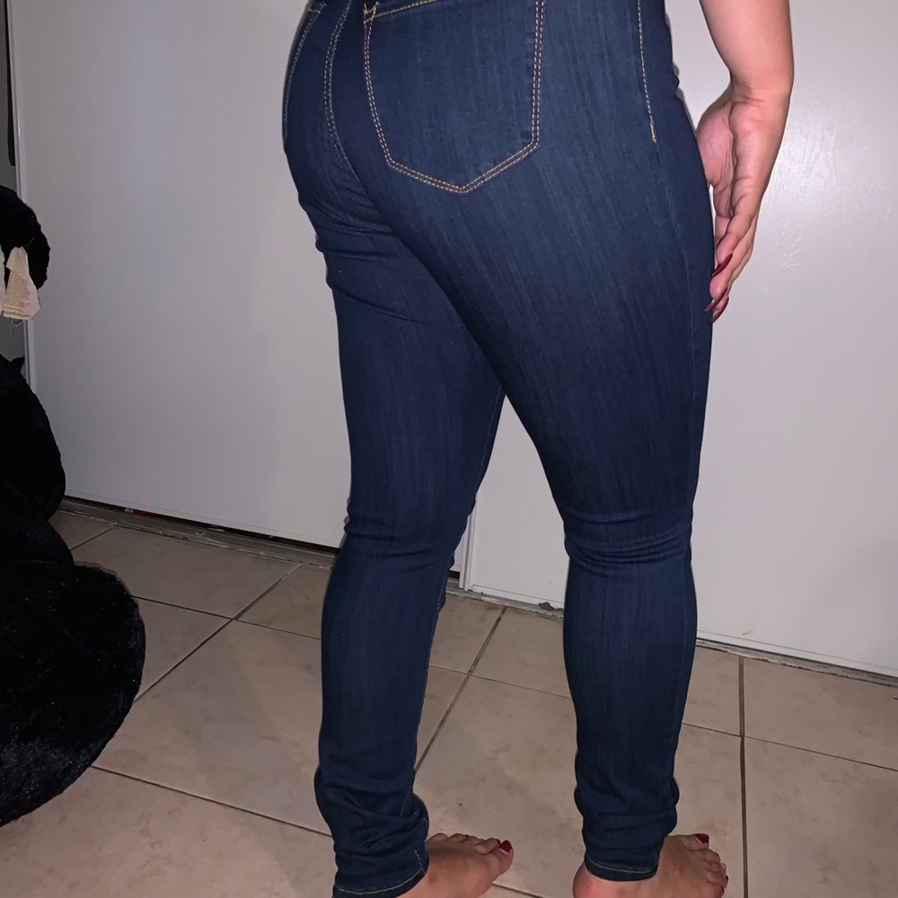 Dark colored jeans.